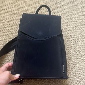 this black backpack/crossbody,it has only been used slightly.